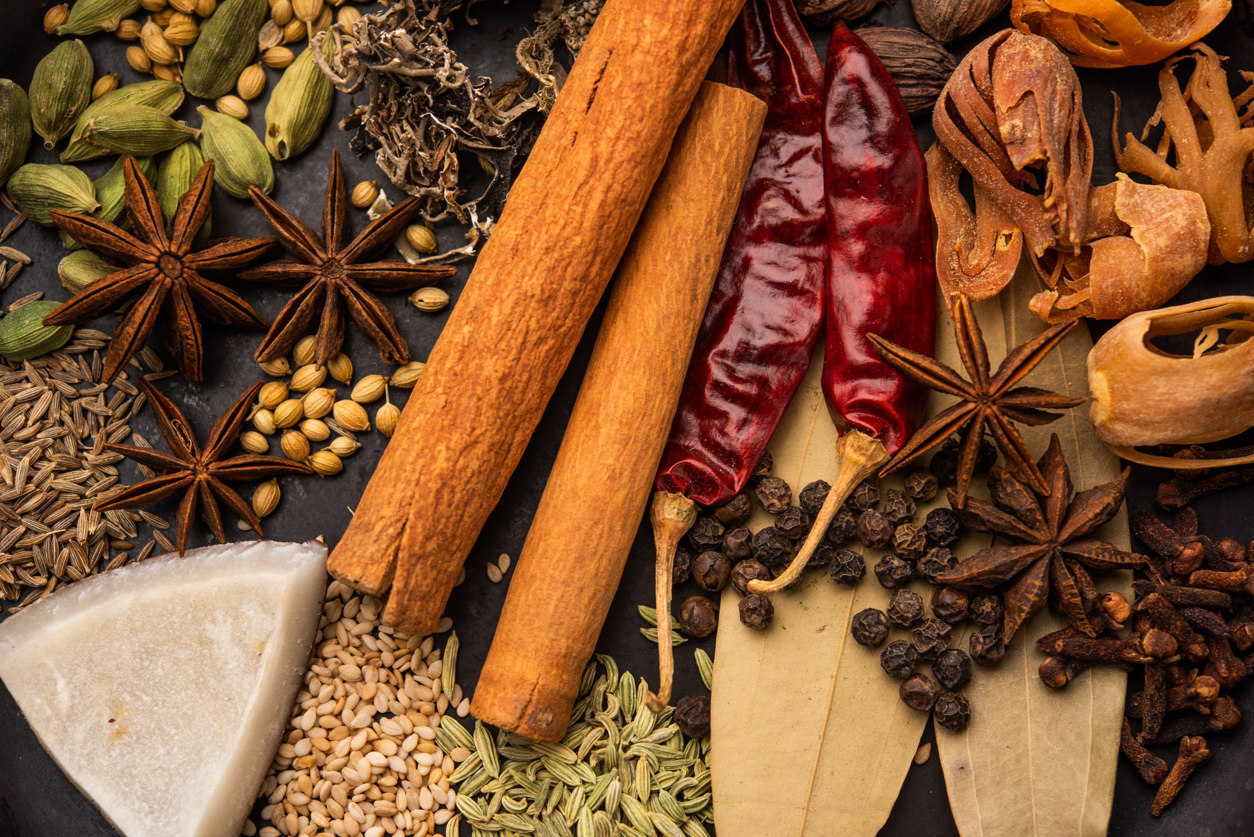 Indian Garam masala powder and colourful spices. selective focus